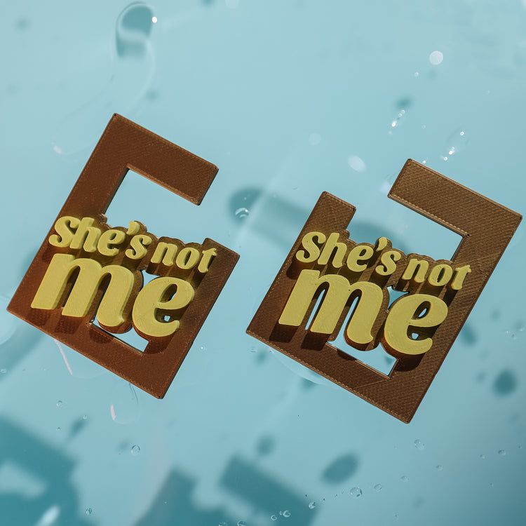 She's Not Me Earrings